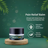 Pain Relief Balm jar on a wooden stand with green leaves and text on a dark green background