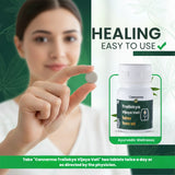 Person holding a tablet with Cannarma Trailokya Vijaya Vati bottle and text about healing and easy use.