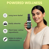 Woman holding a bottle with 'Powered Wellness' text and product benefits on a green background