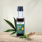 Cannarma Cold Pressed Hemp Seed Oil in a clear bottle with hemp leaves and seeds for nutritional benefits